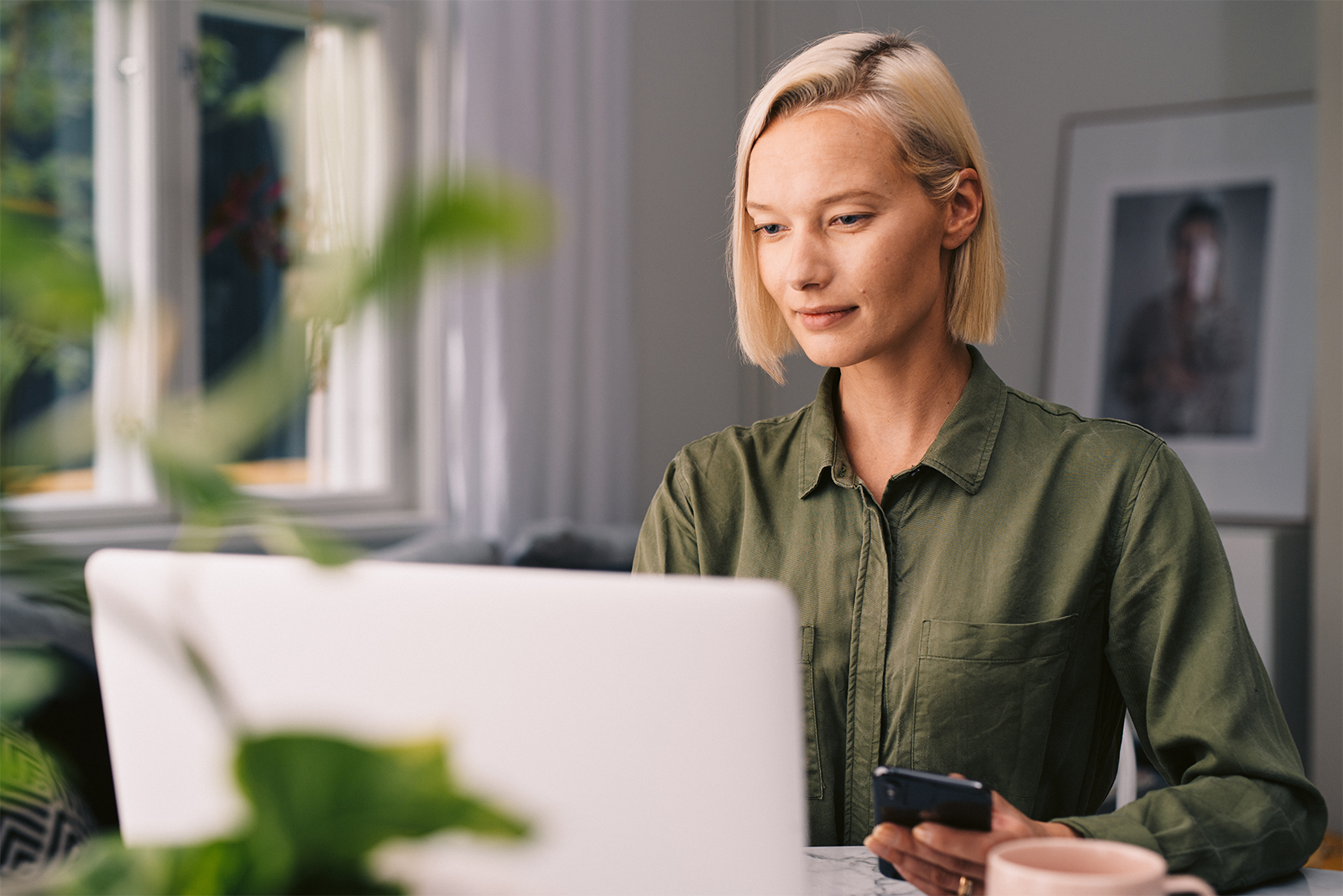 Woman on a laptop.